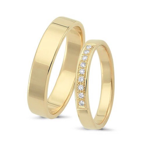 Smukke Nuran vielsesringe i 14 kt guld med 9 diamanter på 0,09 ct
